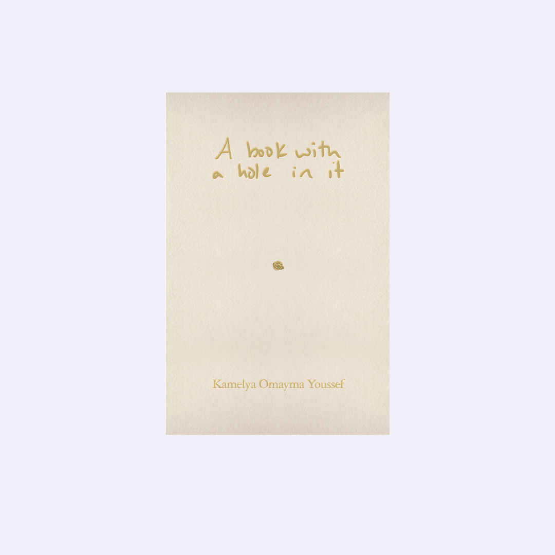 A book with a hole in it - Kamelya Omayma Youssef